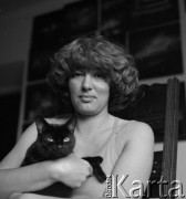 Wiosna 1978, Polska.
Malarka Lidia Boniecka w swoim mieszkaniu.
Fot. Irena Jarosińska, zbiory Ośrodka KARTA