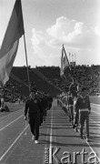 Maj 1959, Warszawa, Polska.
Mecz Lekkoatletyczny Polska - Związek Radziecki na Stadionie Dziesięciolecia. Przemarsz polskich i radzieckich zawodników podczas otwarcia zawodów.
Fot. Romuald Broniarek/KARTA