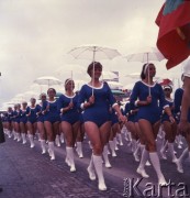 22.07.1969, Warszawa, Polska. 
Uroczyste obchody 25-lecia PRL, defilada sportowo-wojskowa - dziewczyny w strojach sportowych z parasolkami.
Fot. Romuald Broniarek/KARTA