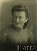 Druga połowa lat 30. do 1941, Kozienice, Polska.
Fela Szpigel, krewna Szmula, przeżyła wojnę, zamieszkała w Brukseli. 
Zdjęcie wykonane w atelier fotograficznym żydowskiego fotografa Chaima Bernemana. Przed wojną zakład mieścił się w Kozienicach na rogu ulic Warszawskiej i Maciejowickiej, przed wybuchem wojny albo już w czasie niemieckiej okupacji  został przeniesiony na ulicę Lubelską 13. Cała kolekcja jest datowana na okres od drugiej połowy lat 30-tych do roku 1941, kiedy Chaim Berneman wraz z rodziną został zesłany do obozu pracy w Wolanowie. Berneman zmarł po ucieczce z obozu.
Fot. Chaim Berneman (Chaim Berman), zbiory Ośrodka KARTA