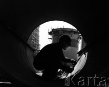 1974, Dąbrowa Górnicza, Polska.
Budowa Huty Katowice - największego i najnowocześniejszego w PRL kombinatu metalurgicznego.
Fot. Wojciech Druszcz, zbiory Ośrodka KARTA
