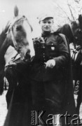 1944, brak miejsca.
Porucznik Longin Wojciechowski ps. Ronin – w czasie wojny adiutant, a później zastępca dowódcy 5 Wileńskiej Brygady Armii Krajowej porucznika Zygmunta Szendzielerza ps. Łupaszka. Od marca 1944 roku dowódca 4 Wileńskiej Brygady Armii Krajowej. Aresztowany 17 lipca 1944 roku, zesłany do ZSRR, skąd wrócił w listopadzie 1947 roku. 
Fot. NN, kolekcja Wincentego Borodziewicza, zbiory Ośrodka KARTA, przekazała Wanda Borodziewicz
