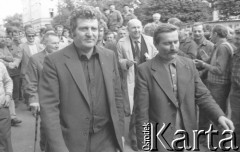 Sierpień 1980, Gdańsk, Polska.
Strajk okupacyjny w Stoczni Gdańskiej im. Lenina. Lech Wałęsa i dyrektor stoczni Klemens Gniech. Za nimi z lewej Lech Bądkowski i Bogdan Lis.
Fot. Zbigniew Trybek, zbiory Ośrodka KARTA

