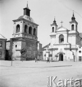 1928-1936, Stanisławów (obecnie Iwano-Frankiwsk), Polska (obecnie Ukraina).
Kościół pw. Najświętszej Marii Panny i dzwonnica.
Fot. NN, kolekcja Witolda Lis-Olszewskiego, zbiory Ośrodka KARTA