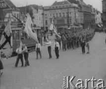 3.05.1946, Roubaix, Francja. 
Uroczystości  rocznicy uchwalenia Konstytucji 3 maja oraz prawdopodobnie poświęcenia Domu Polskiego. Pochód członków polskich organizacji oraz żołnierzy Polskich Sił Zbrojnych ulicą miasta.
Fot. Jerzy Konrad Maciejewski, zbiory Ośrodka KARTA