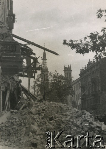 Po 1.09.1939, Warszawa, Polska.
Ulica Marszałkowska, widok na plac Zbawiciela.
Fot. NN, zbiory Ośrodka KARTA, udostępnił Roman Trojanowicz