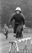 16.09.1989, Żyrardów, woj. Skierniewice, Polska
I Wojewódzkie Zawody Młodzieżowe w Sporcie Pożarniczym, bieg po kładce.
Fot. Jarosław Tarań, zbiory Ośrodka KARTA [89-84] 
