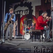 29.10.1970, Warszawa, Polska.
Gerry Mulligan (saksofon), Dave Brubeck (fortepian), Alan Dawson (perkusja) i Alan Dawson (kontrabas) podczas XIII Międzynarodowego Festiwalu Jazzowego Jazz Jamboree '70 w Sali Kongresowej w Pałacu Kultury i Nauki.
Fot. Bogdan Łopieński, zbiory Ośrodka KARTA