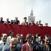 1.05.1974, Warszawa, Polska.
Obchody Święta Pracy. Przywódcy partyjni i przedstawiciele władz obserwują pochód z trybuny honorowej na placu Defilad. Widoczni m.in.: minister spraw zagranicznych Stefan Olszowski  (4. z lewej), minister obrony narodowej Wojciech Jaruzelski (w mundurze), członek Biura Politycznego KC  Edward Babiuch (4. z prawej) i  Władysław Kruczek (2. z prawej).
Fot. Edward Grochowicz, zbiory Ośrodka KARTA.
