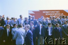 1.05.1987, Warszawa, Polska.
Pochód pierwszomajowy na placu Zwycięstwa (obecnie plac Piłsudskiego), na zdjęciu przedstawiciele władz partyjnych i państwowych na trybunie honorowej, od lewej: Kazimierz Barcikowski, Jan Dobraczyński, Roman Malinowski,  Zbigniew Messner, Wojciech Jaruzelski, NN, Henryk Jabłoński.
Fot. Edward Grochowicz, zbiory Ośrodka KARTA
