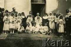 Koniec lat 30., Czortków, woj. tarnopolskie, Polska.
I Komunia Święta Marii Witwickiej (2. z lewej w 1. rzędzie).
Fot. NN, zbiory Archiwum Historii Mówionej Ośrodka KARTA i Domu Spotkań z Historią, udostępniła Maria Witwicka w ramach projektu 